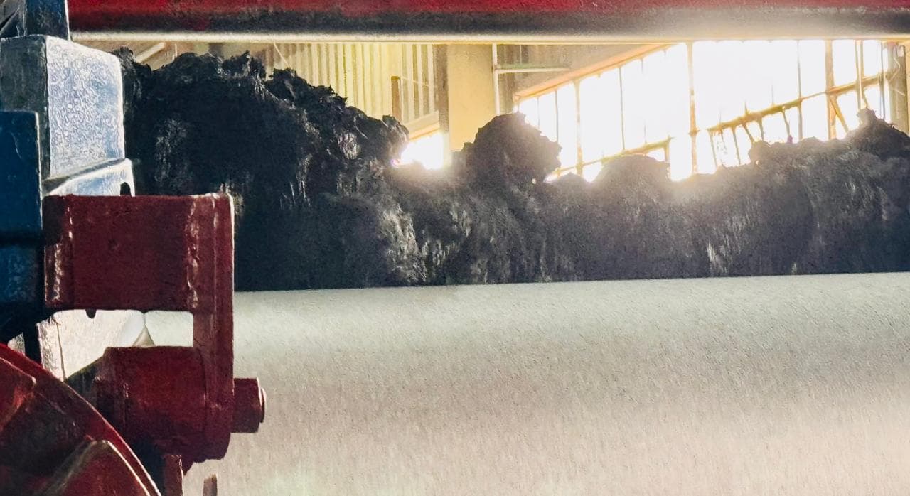 Black rubber compound block showing consistency