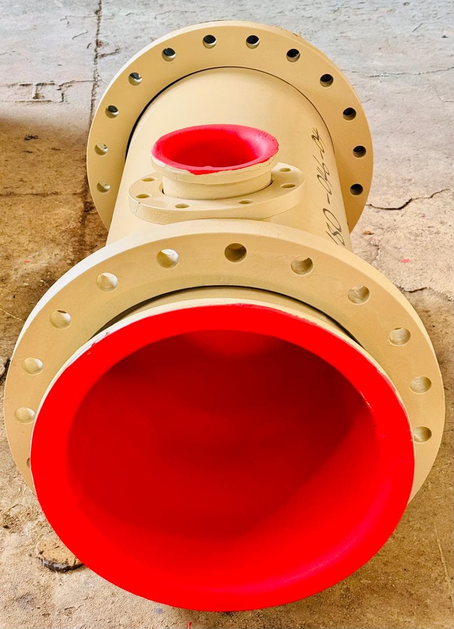 Red rubber lined reducer for titanium mine piping system