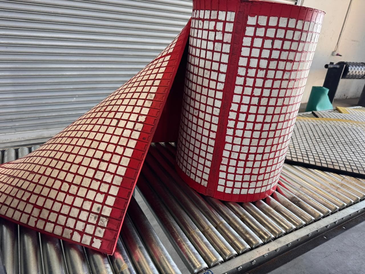 Set of ceramic embedded rubber panels for chute lining