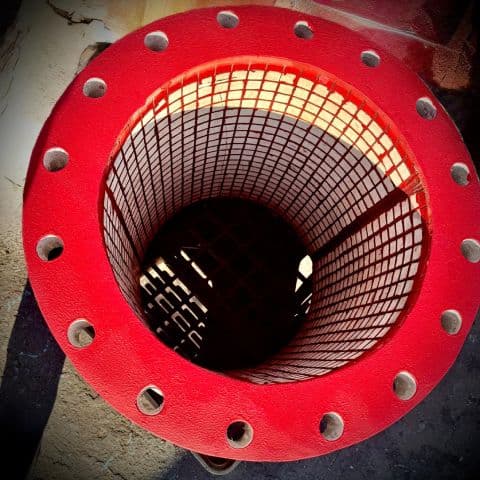 Ceramic embedded rubber hose section showing embedded tiles