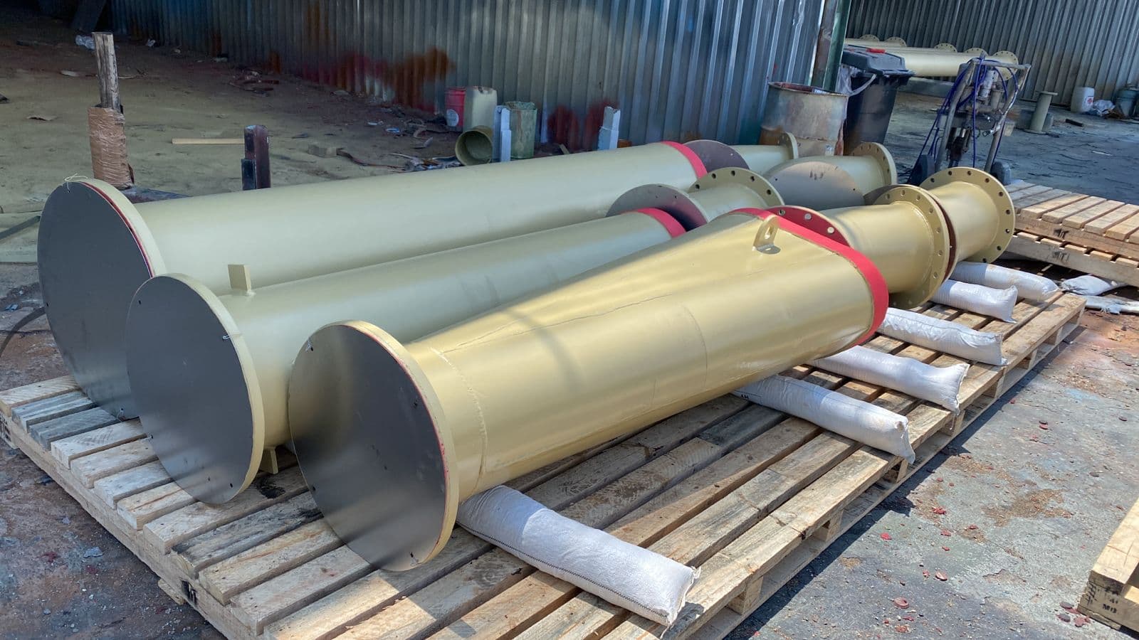 Red rubber lined elbow fitting for titanium mine