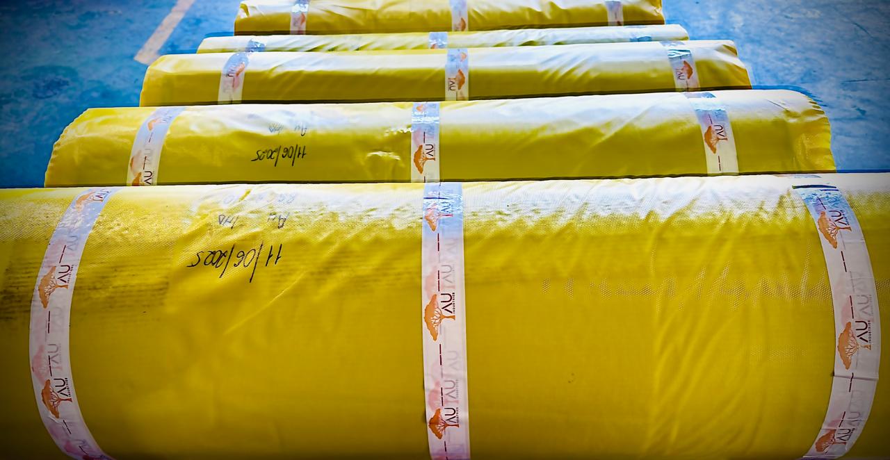 Rolls of AU natural rubber sheeting on delivery truck