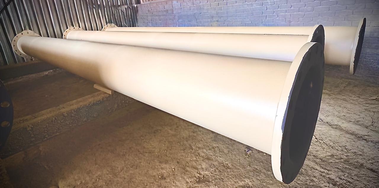 Rubber lined fitting showing black natural rubber interior